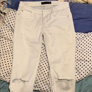 White hole in the knee jeans